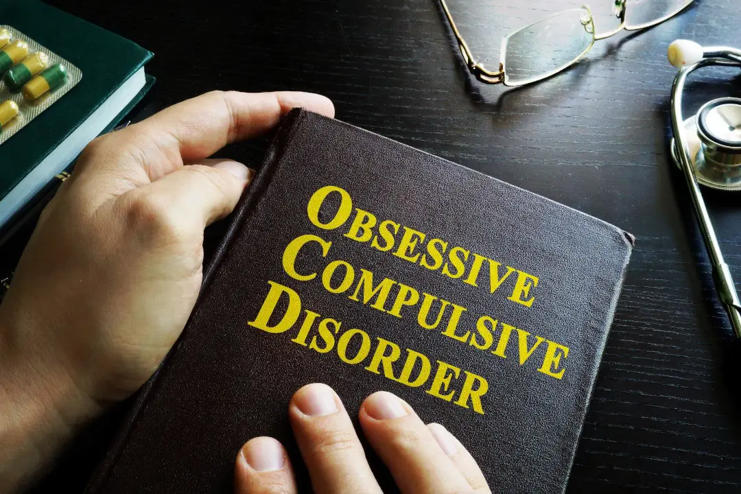 a picture of a brown book titled obsessive compulsive disorder