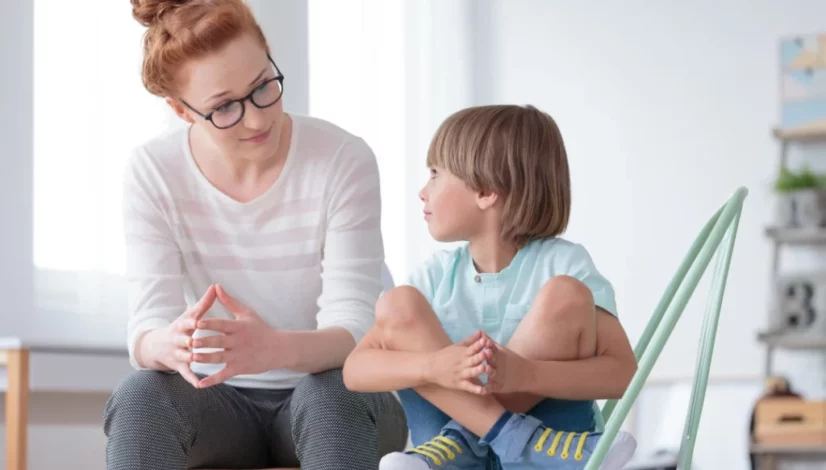 picture of a woman interacting with a child with adhd