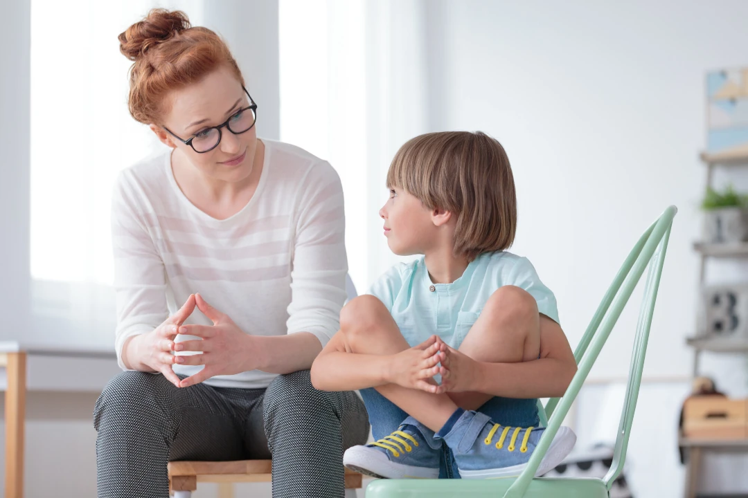 picture of a woman interacting with a child with adhd