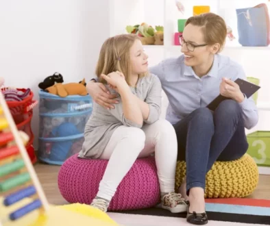 a woman talking to a child